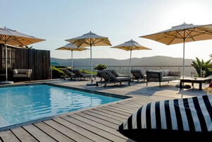 Outdoor pool, pool umbrellas, pool loungers
