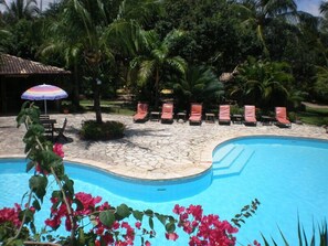 Outdoor pool, open 8:00 AM to 9:30 PM, pool umbrellas, pool loungers