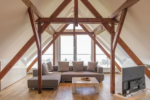 Suite (OnTheTop) | Coin séjour