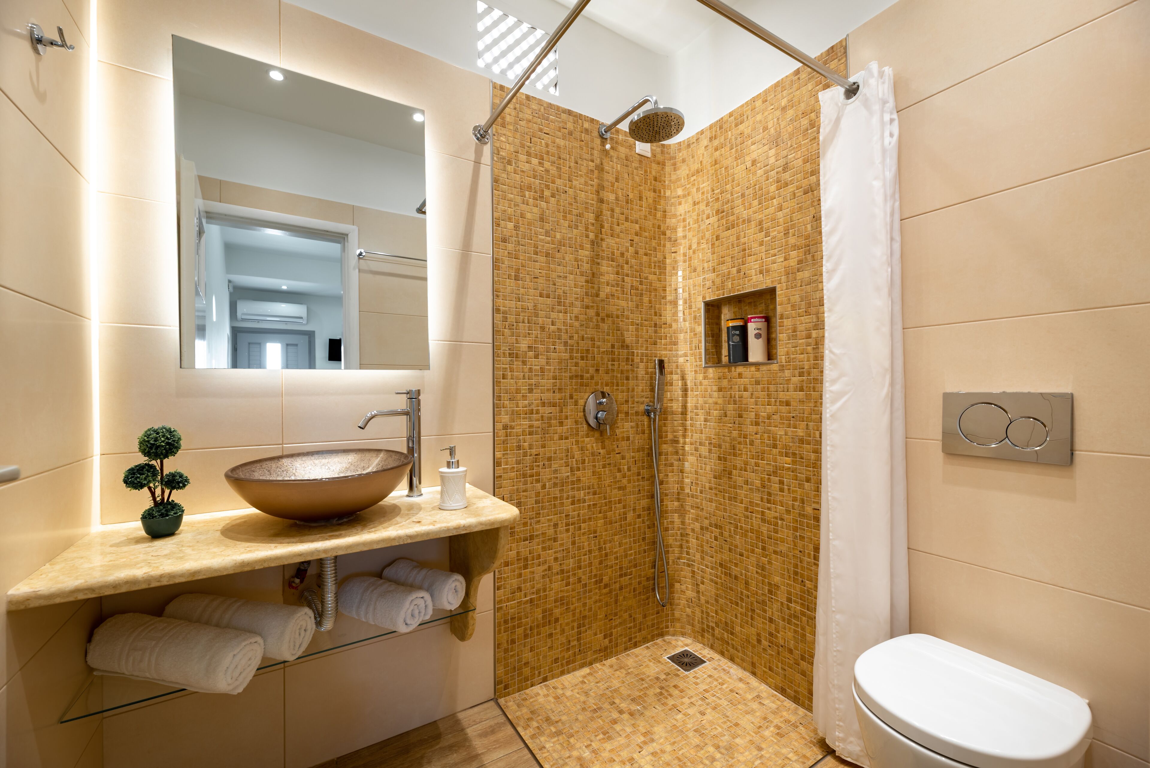 suite | bathroom | shower, hair dryer, towels