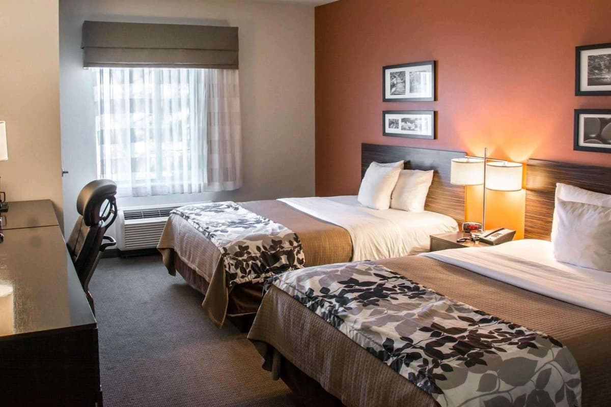 Desk, blackout drapes, iron/ironing board, rollaway beds
