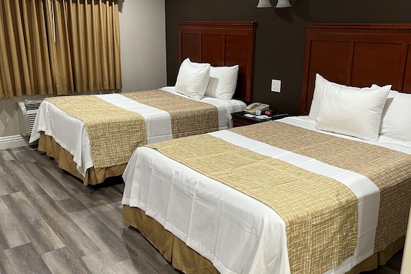 Standard Room, 2 Queen Beds, Non Smoking | Premium bedding, desk, soundproofing, iron/ironing board