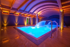 Seasonal outdoor pool, open 9 AM to 6:30 PM, pool umbrellas