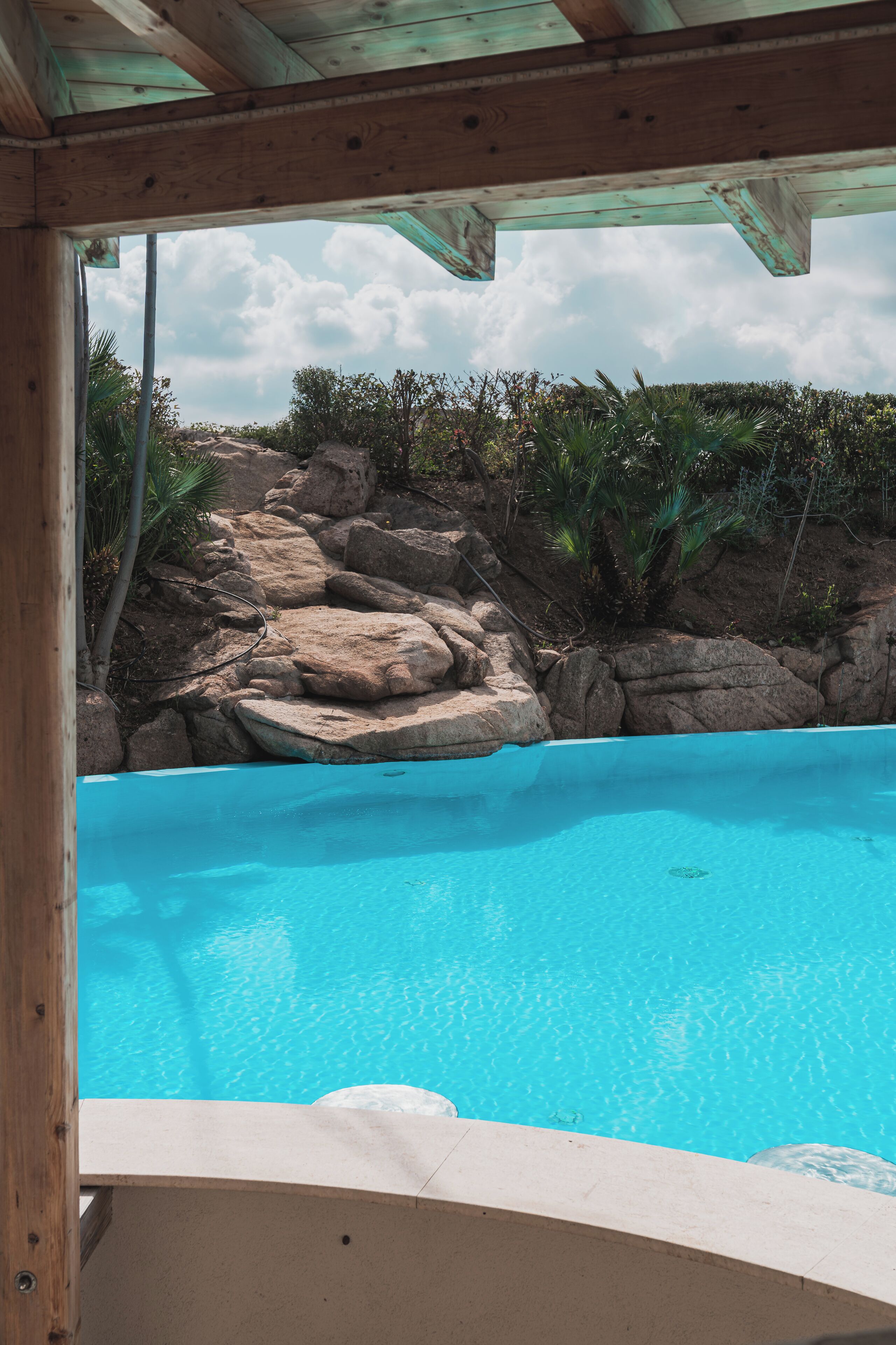 seasonal outdoor pool, open 9 am to 6:30 pm, pool umbrellas