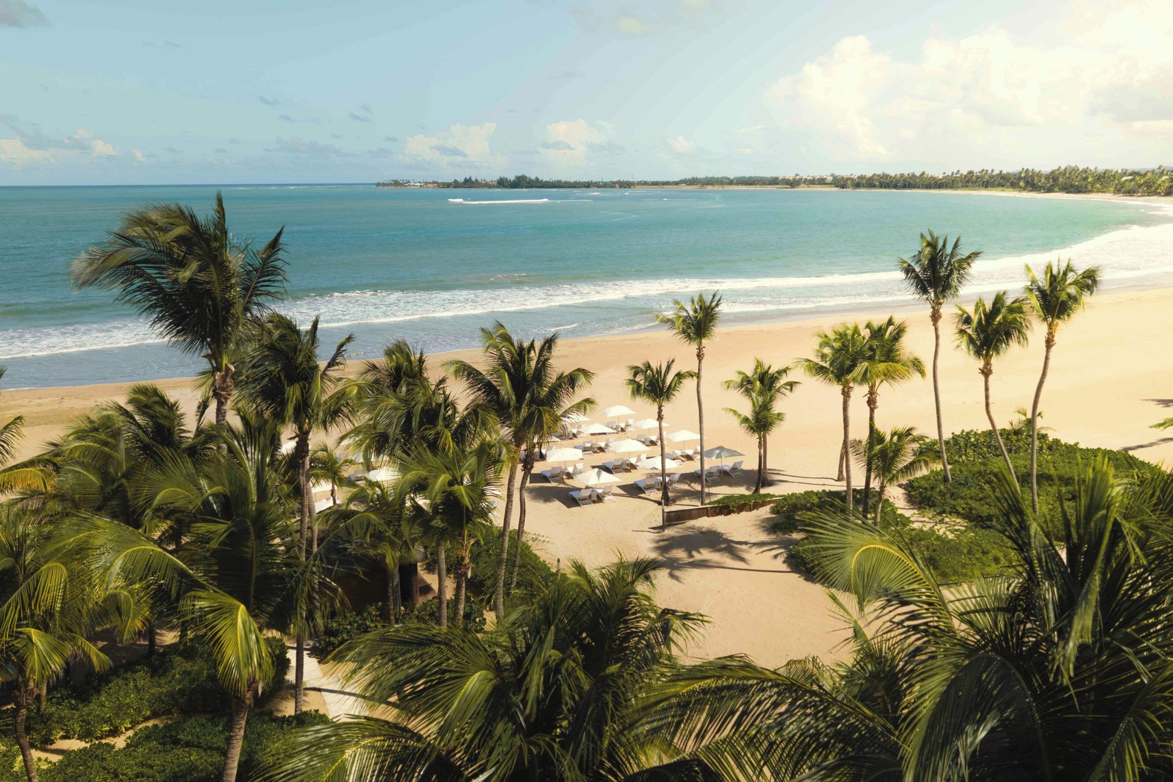 On the beach, beach cabanas, sun loungers, beach umbrellas