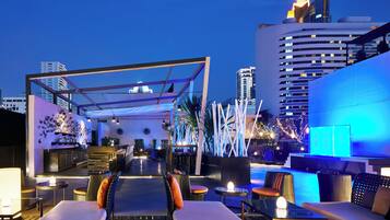 Rooftop bar, pool views, open daily