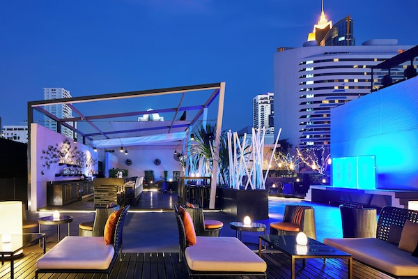 Rooftop bar, pool views, open daily