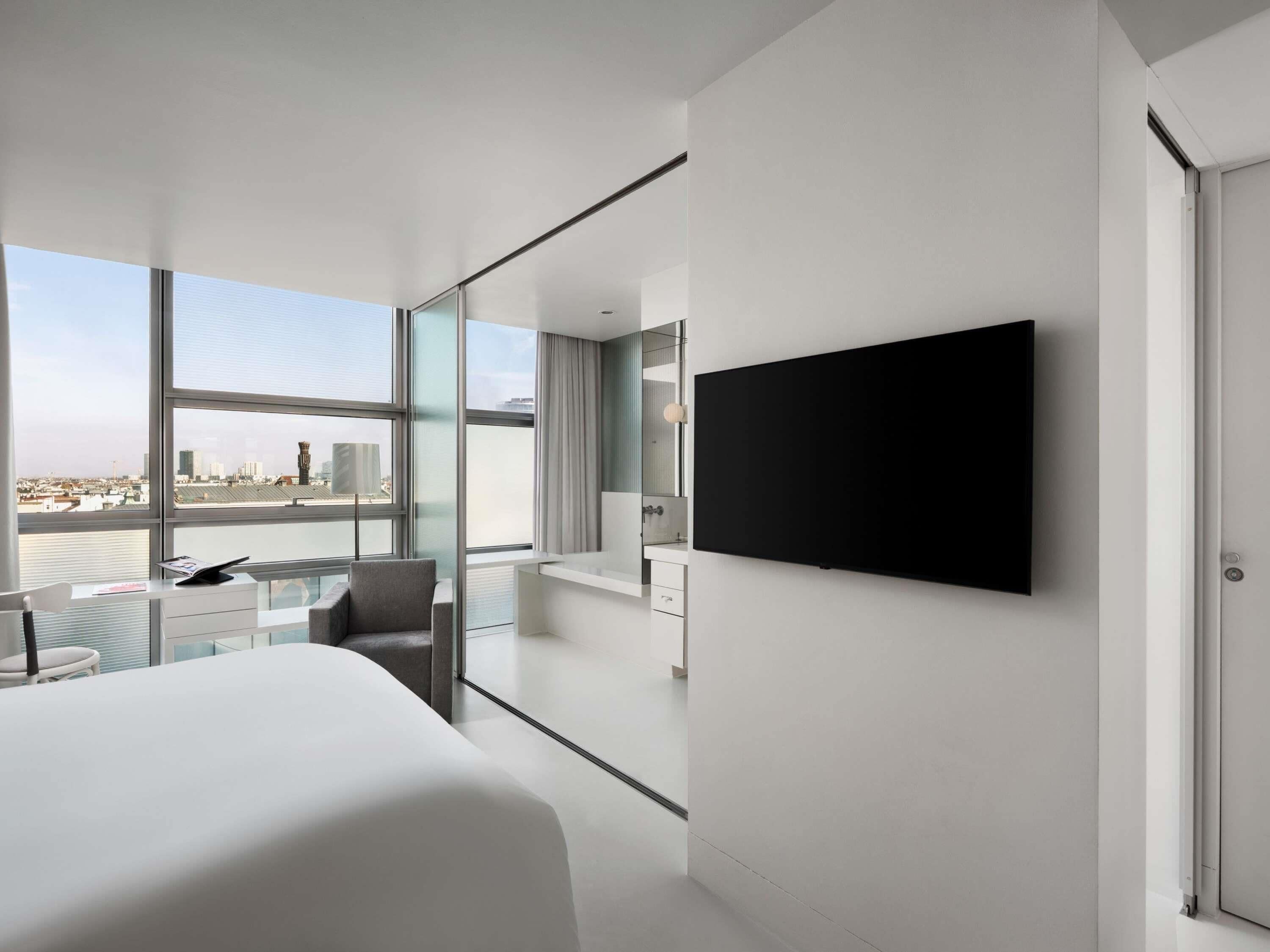 Chambre Classique, 1 grand lit | Literie de qualité supérieure, minibar, coffres-forts dans les chambres