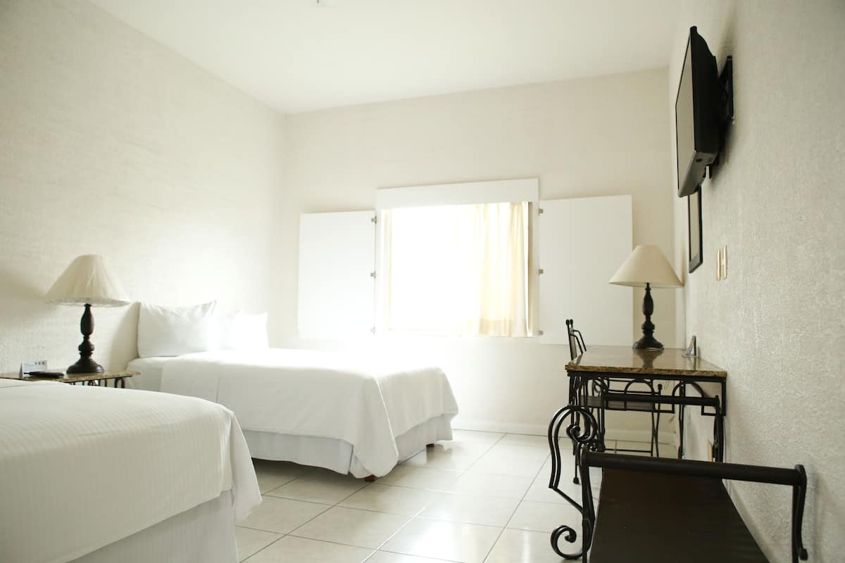 1 bedroom, premium bedding, blackout curtains, iron/ironing board