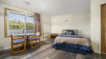 Premium bedding, blackout curtains, iron/ironing board, free WiFi