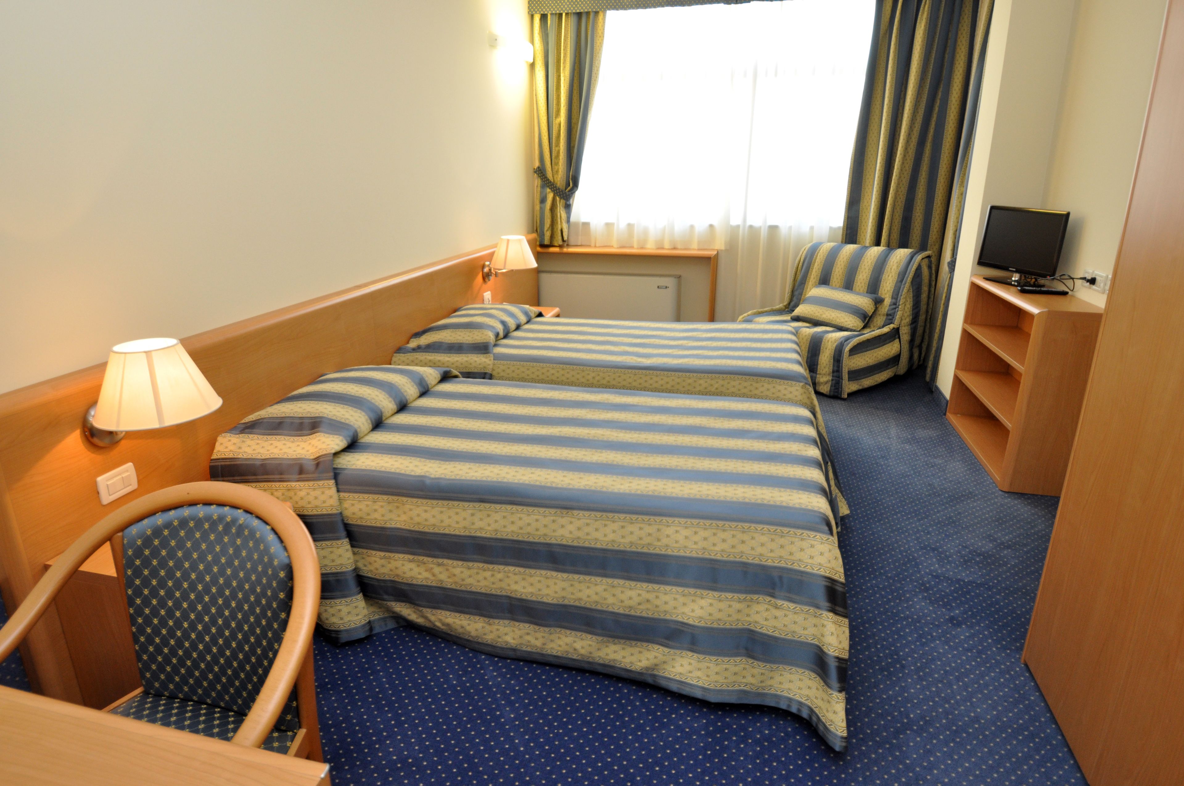 triple room | select comfort beds, minibar, in-room safe, individually furnished