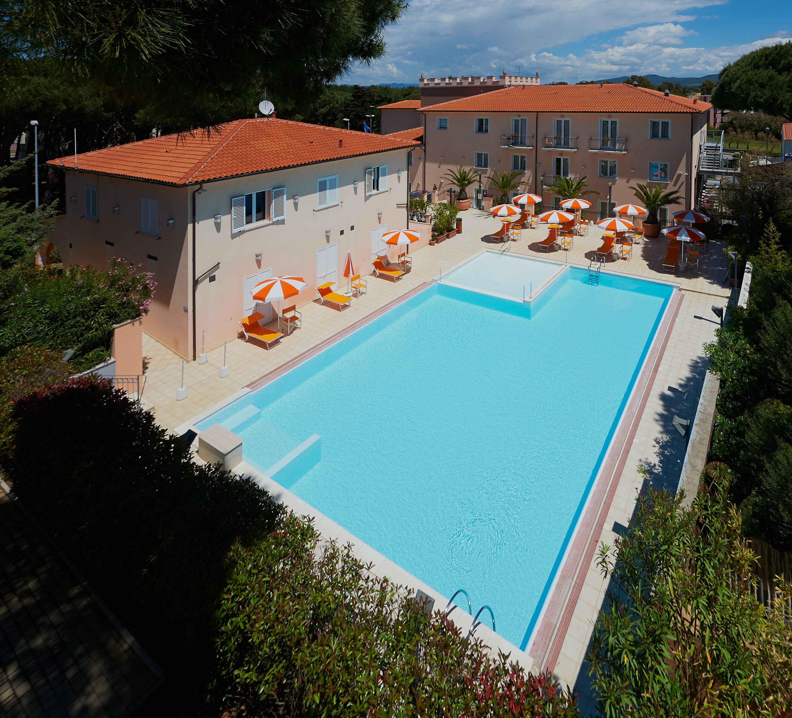 seasonal outdoor pool, open 8:30 am to 7:30 pm, pool umbrellas