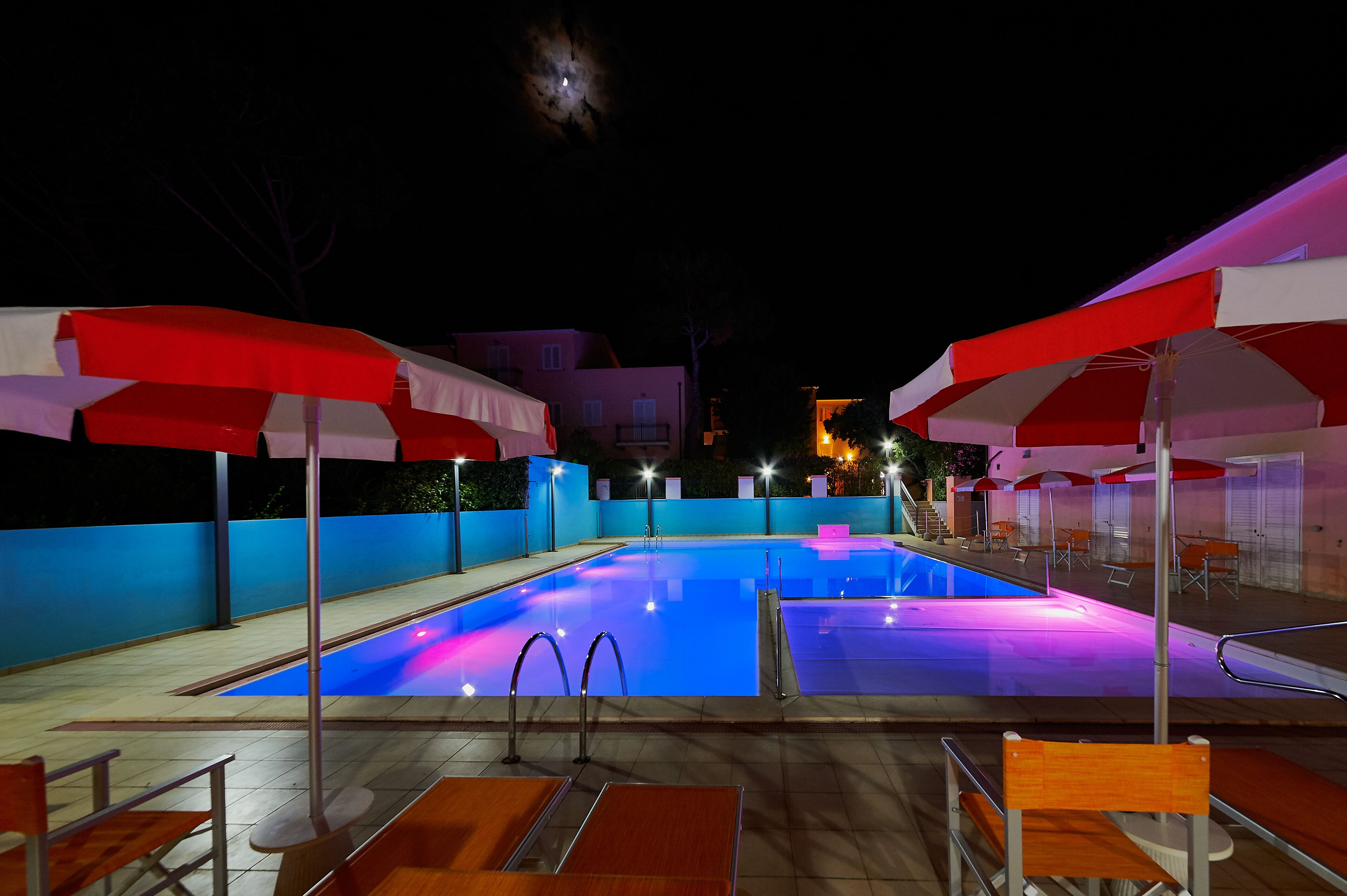 seasonal outdoor pool, open 8:30 am to 7:30 pm, pool umbrellas