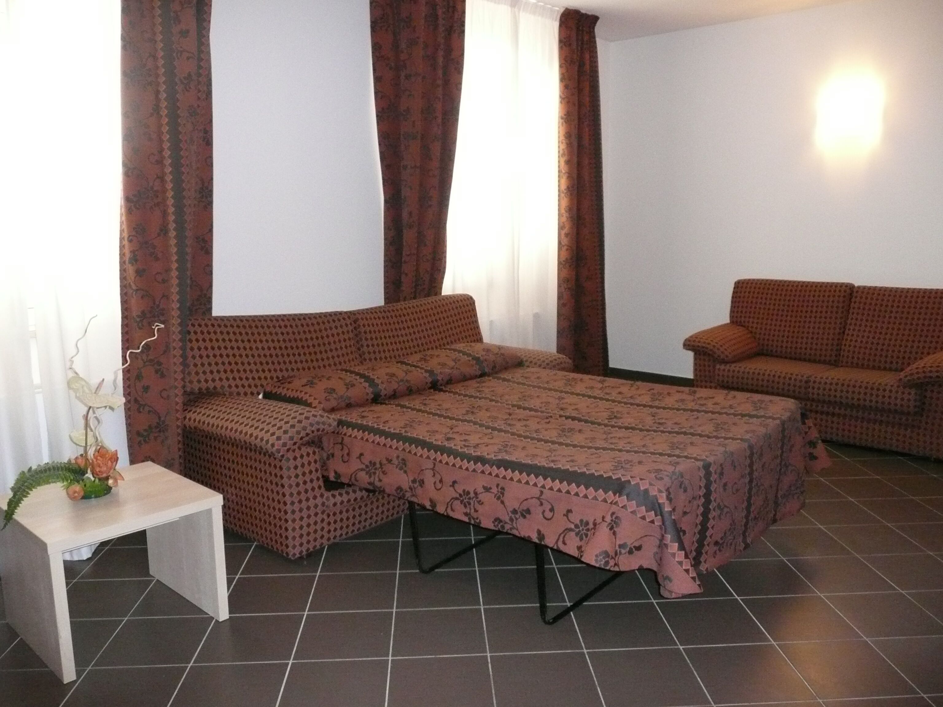 family suite | living area | flat-screen tv