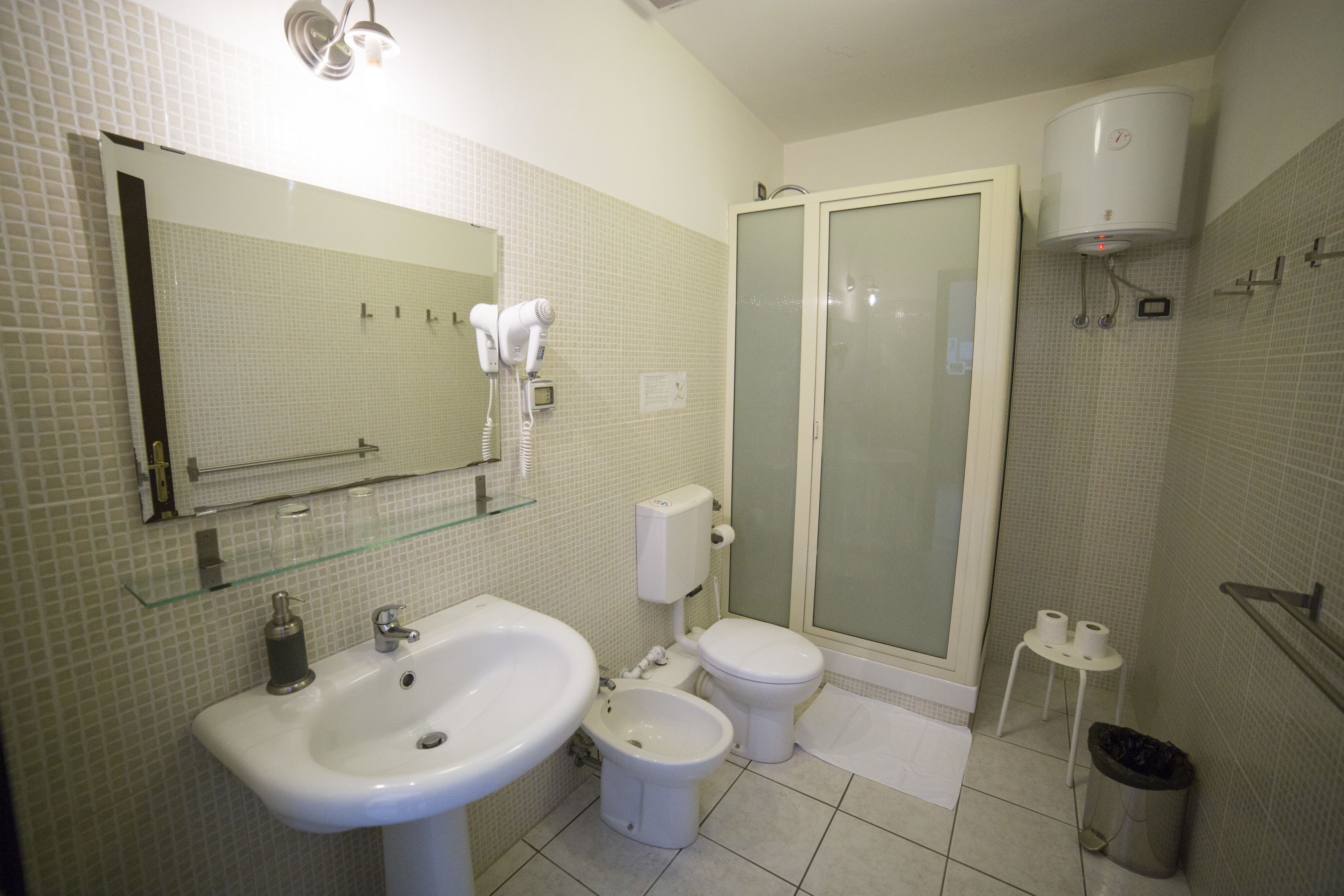 shower, free toiletries, hair dryer, slippers