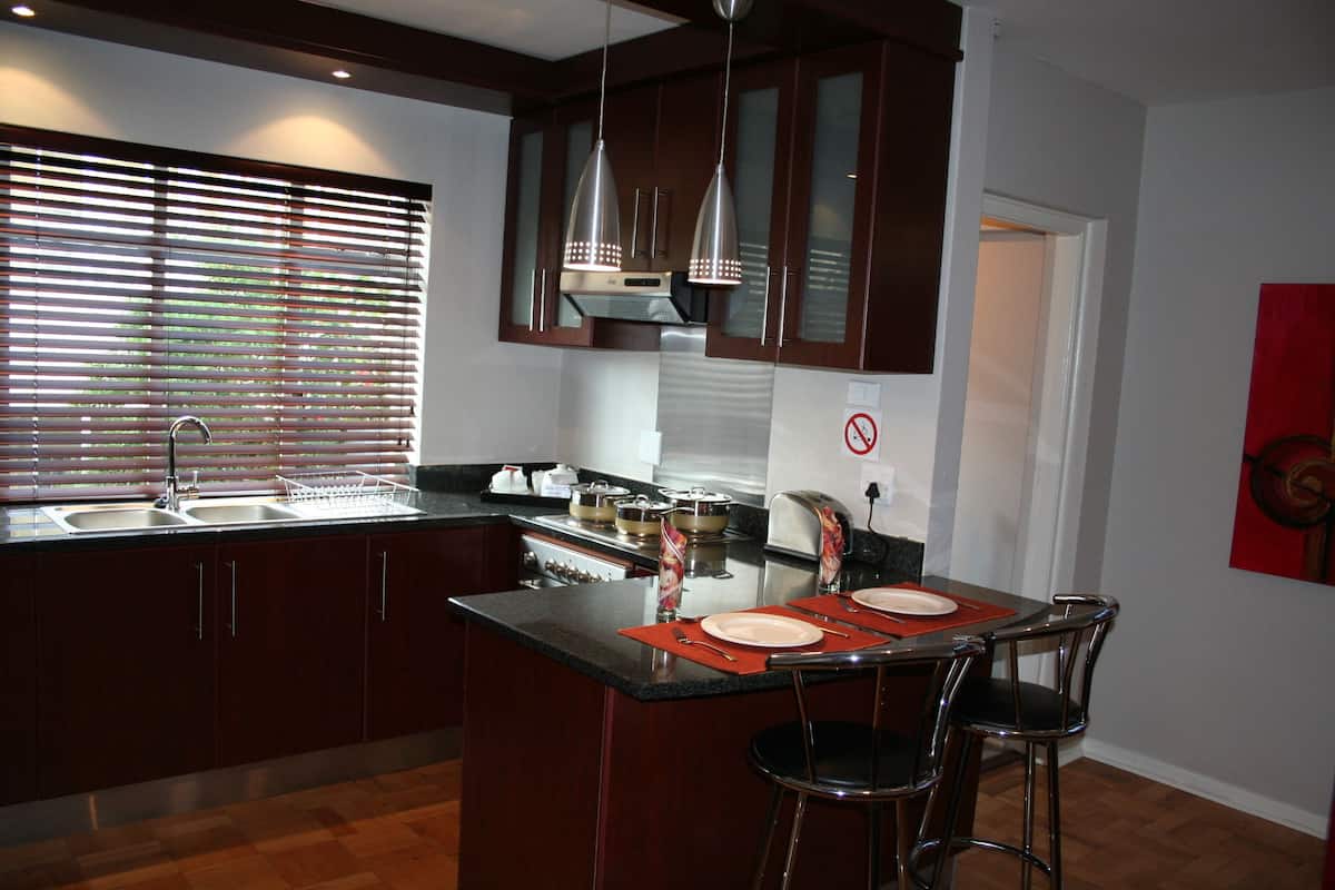 standard apartment, 1 bedroom (big) | private kitchen | full-sized fridge, microwave, stovetop, cookware/dishes/utensils