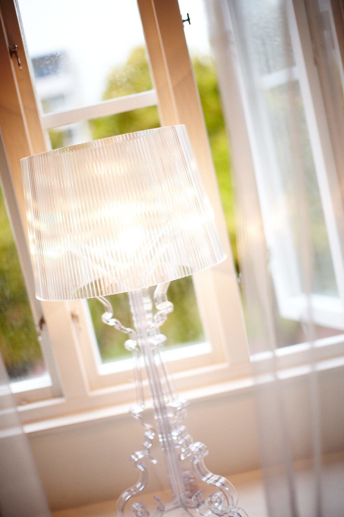 A clear view of a window with a white frame and a clear glass pane.