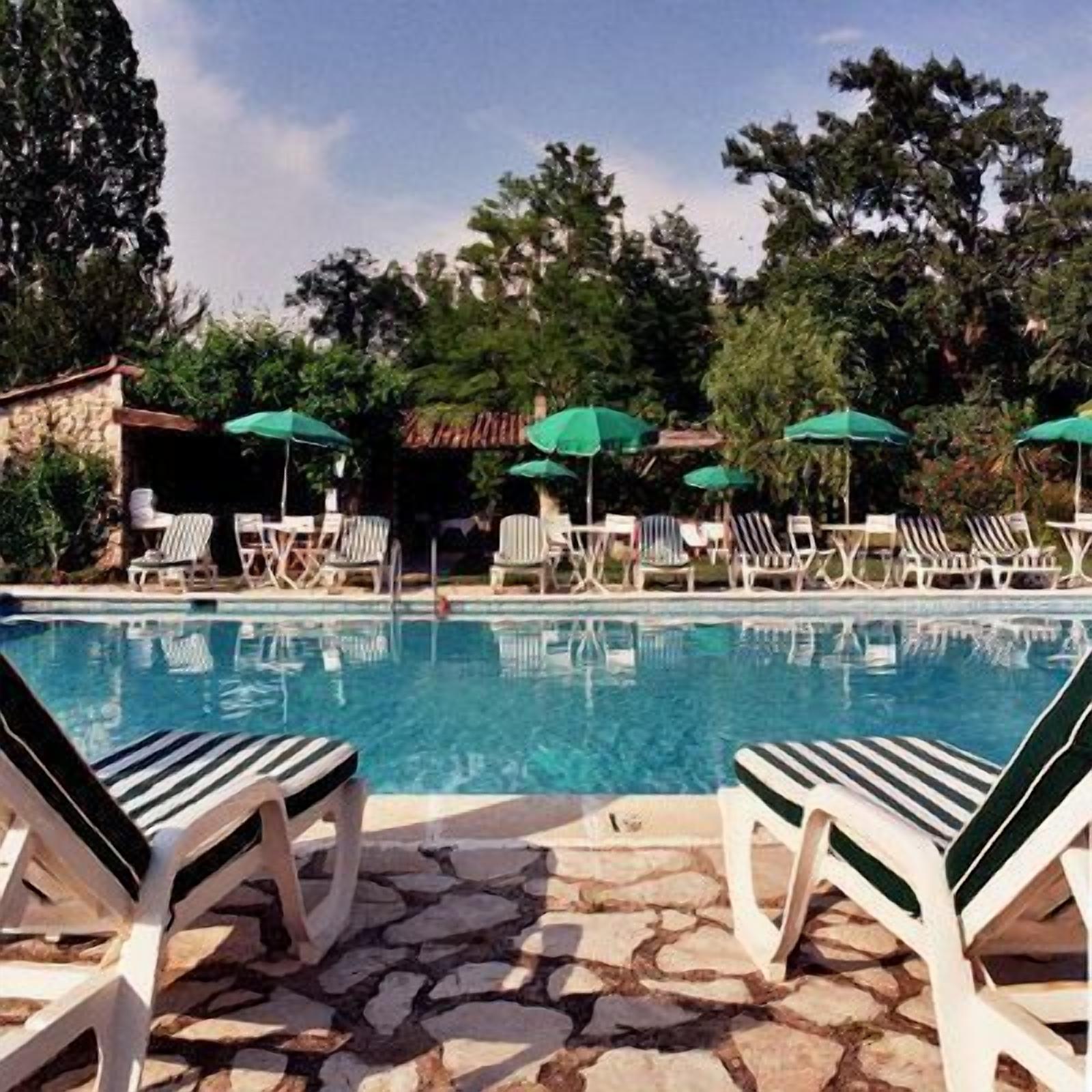 seasonal outdoor pool, pool umbrellas, pool loungers