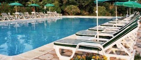 Seasonal outdoor pool, pool umbrellas, sun loungers