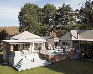 Outdoor pool, pool umbrellas, sun loungers
