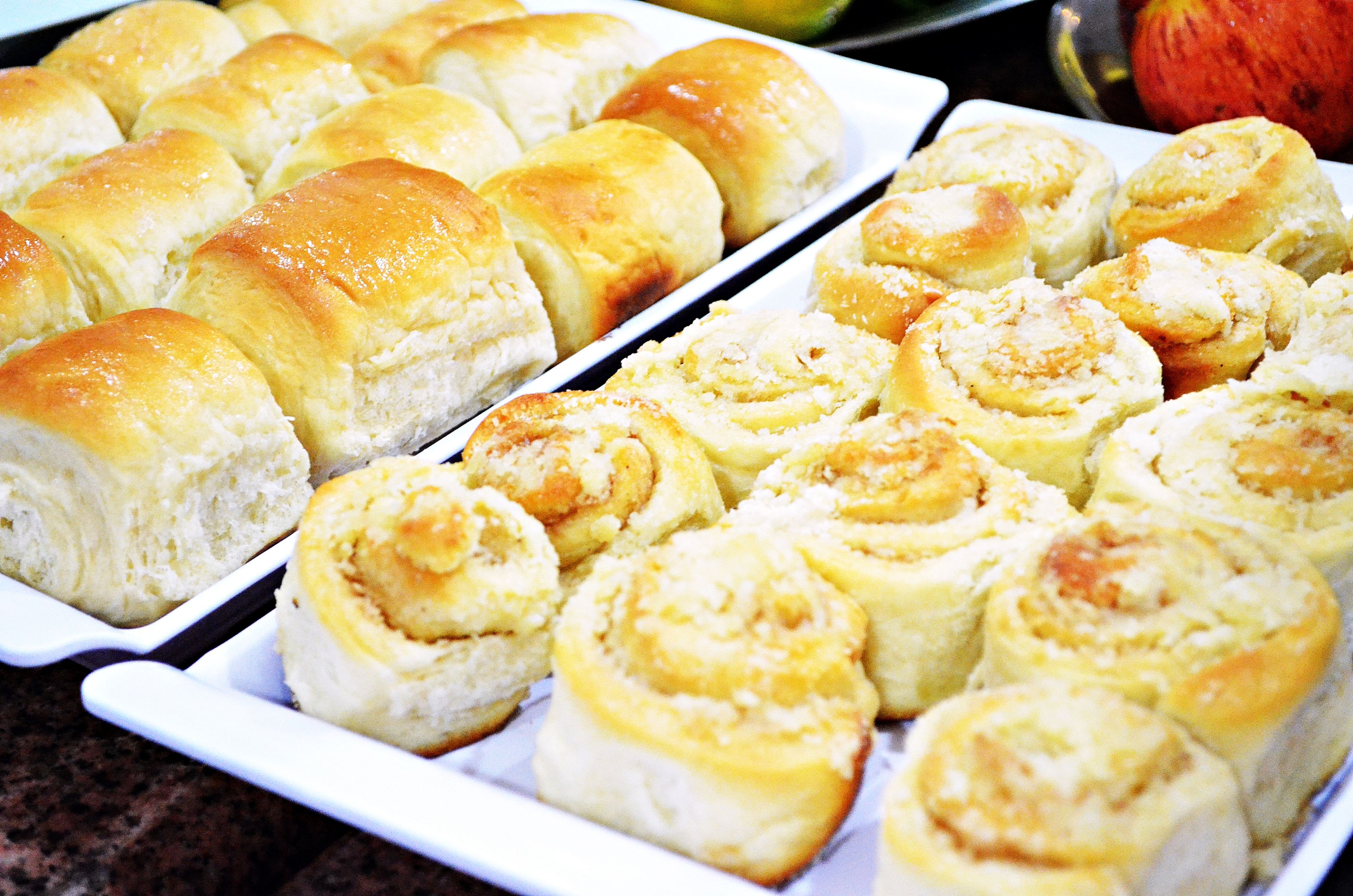 A tray of freshly baked rolls and cinnamon rolls.