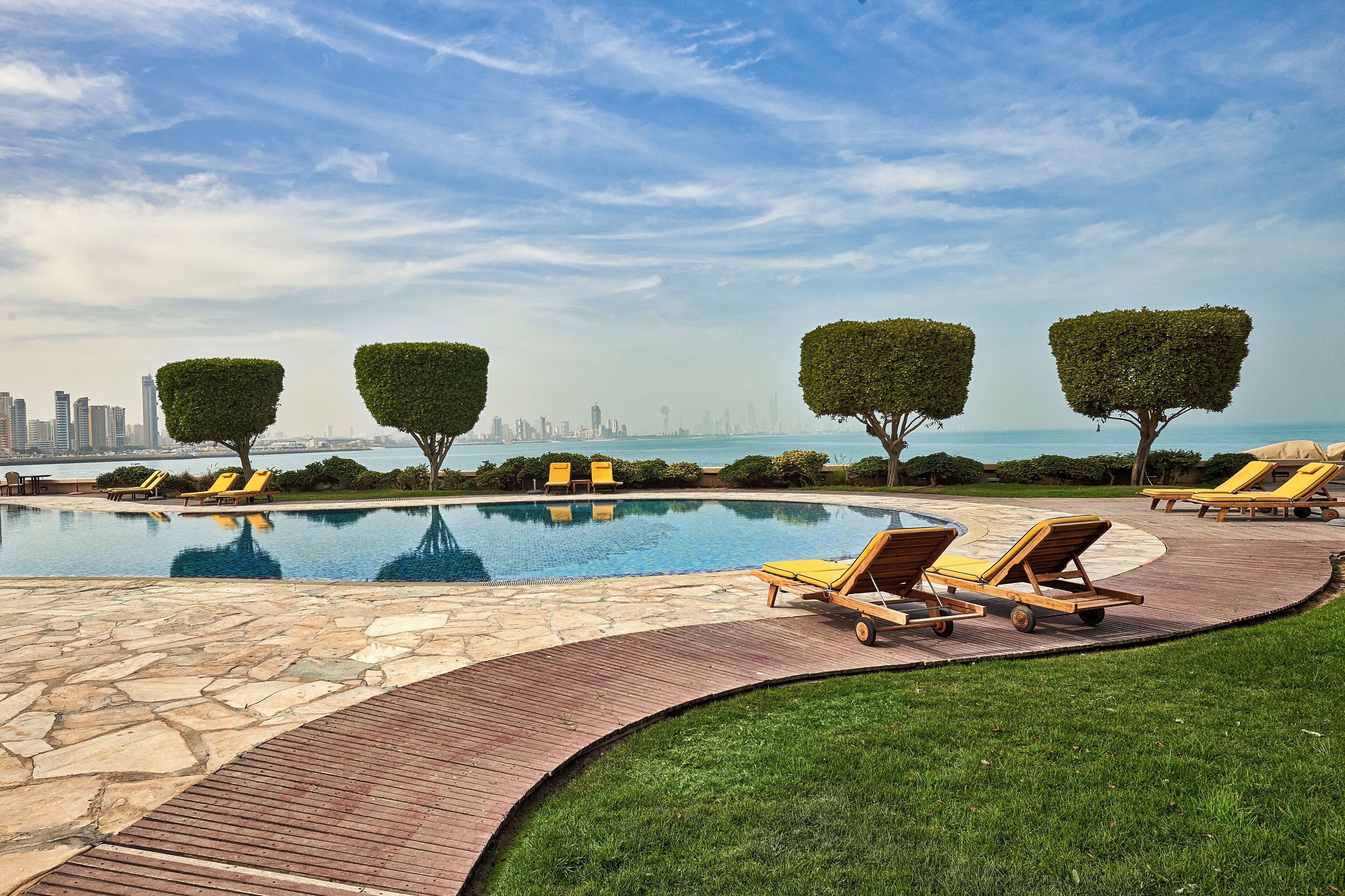 2 outdoor pools, pool umbrellas, pool loungers