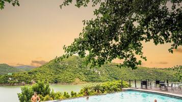 2 outdoor pools, pool umbrellas, pool loungers