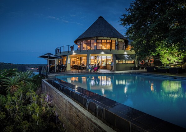 2 outdoor pools, pool umbrellas, pool loungers
