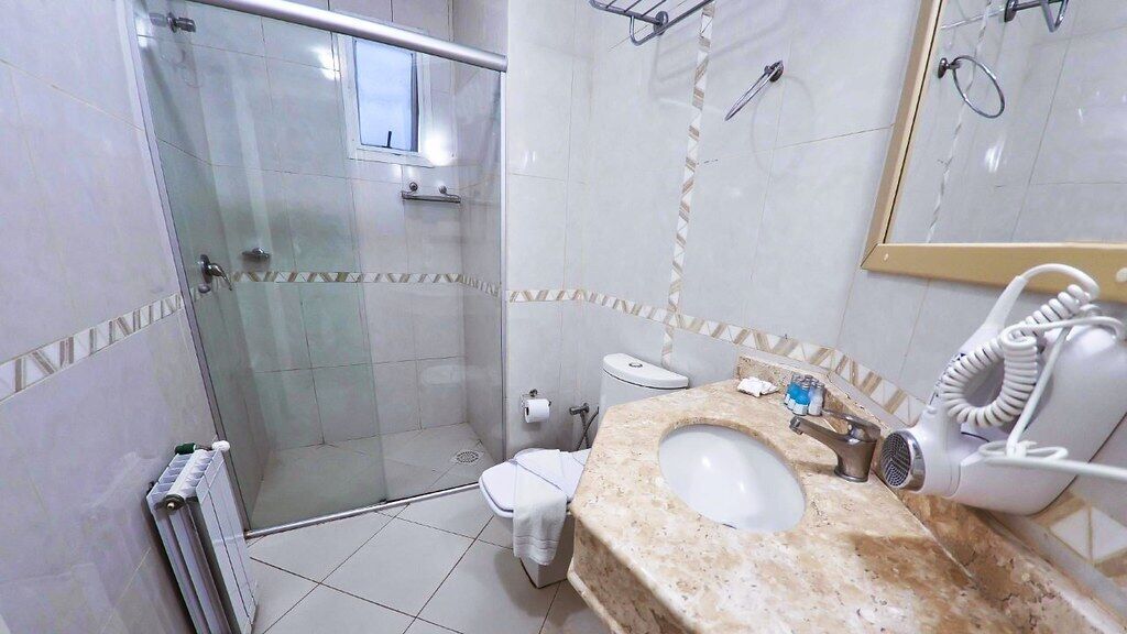 hydromassage showerhead, free toiletries, hair dryer, towels