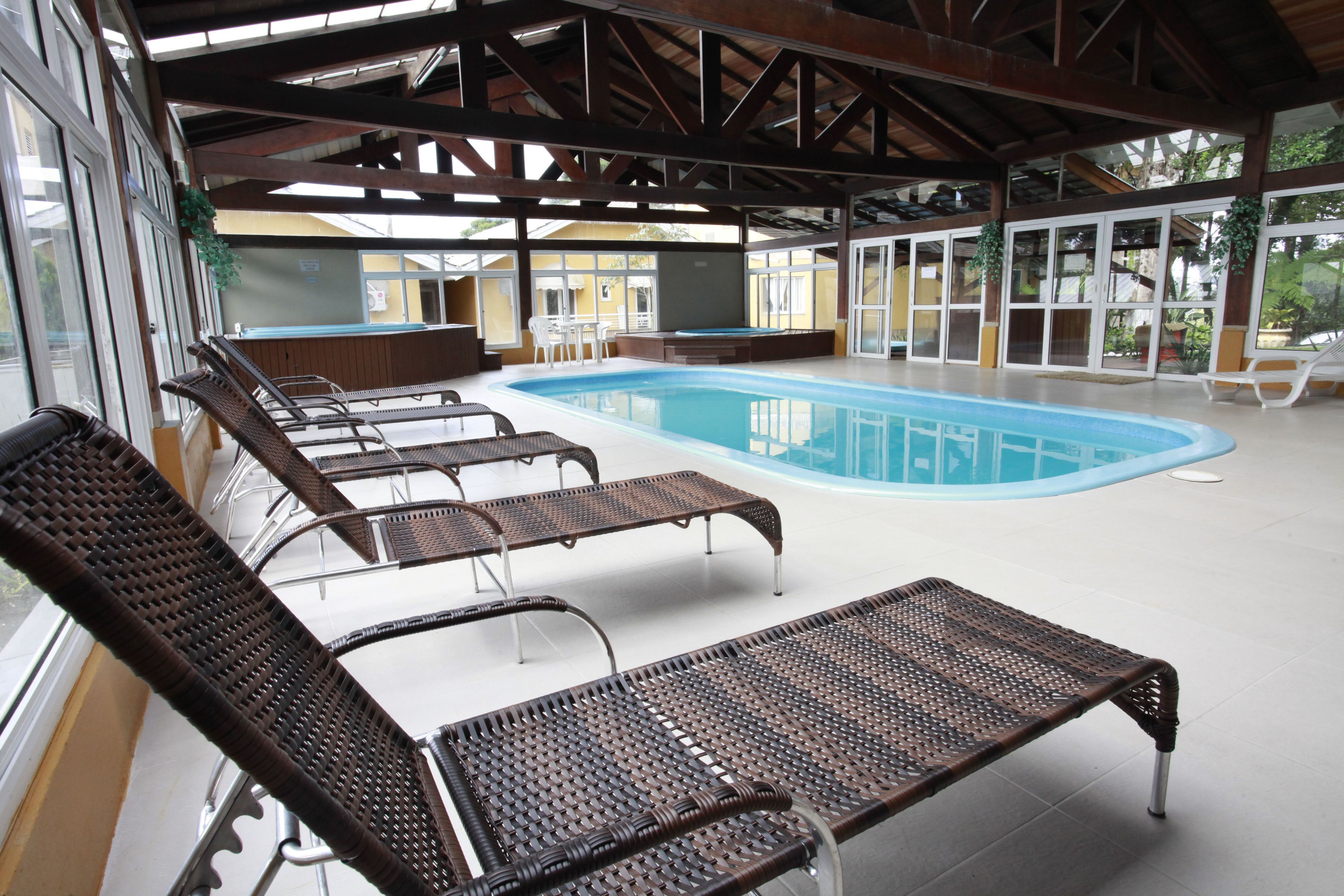 indoor pool, open 10:00 am to 10:00 pm, pool loungers
