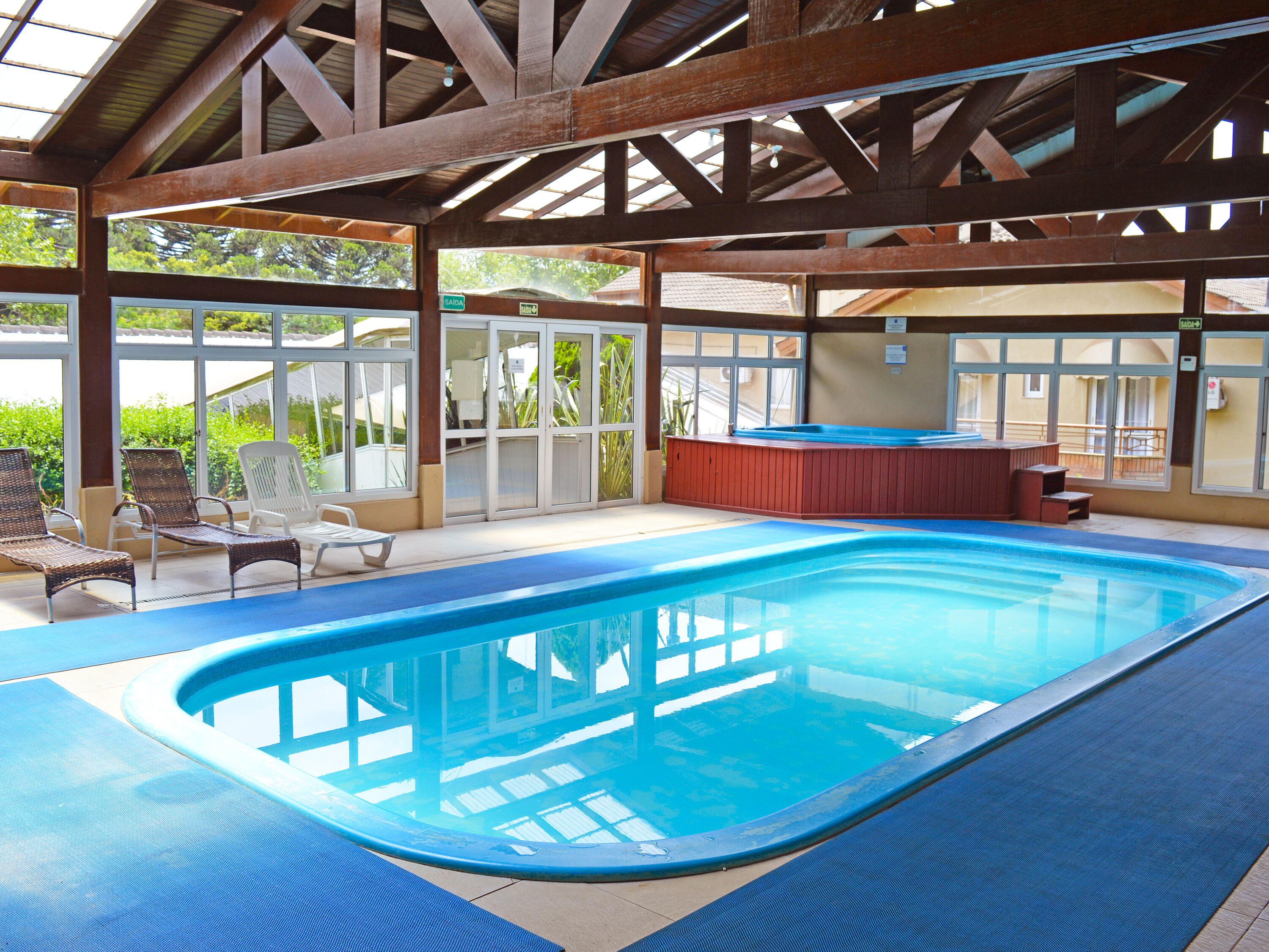 indoor pool, open 10:00 am to 10:00 pm, pool loungers