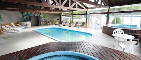 Indoor pool, open 10:00 AM to 10:00 PM, sun loungers