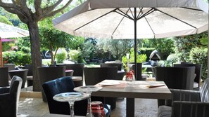 Lunch served, French cuisine, garden views