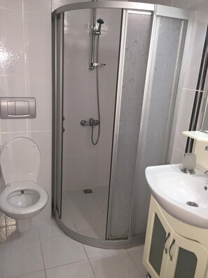 Regadera y secadora de cabello 