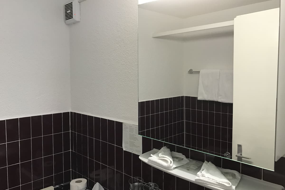 double room, balcony, mountain view | bathroom | combined shower/bathtub, deep-soaking bathtub, free toiletries