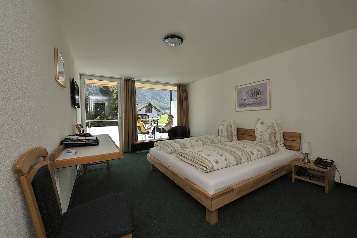 double room, balcony, mountain view | premium bedding, pillow-top beds, in-room safe, desk