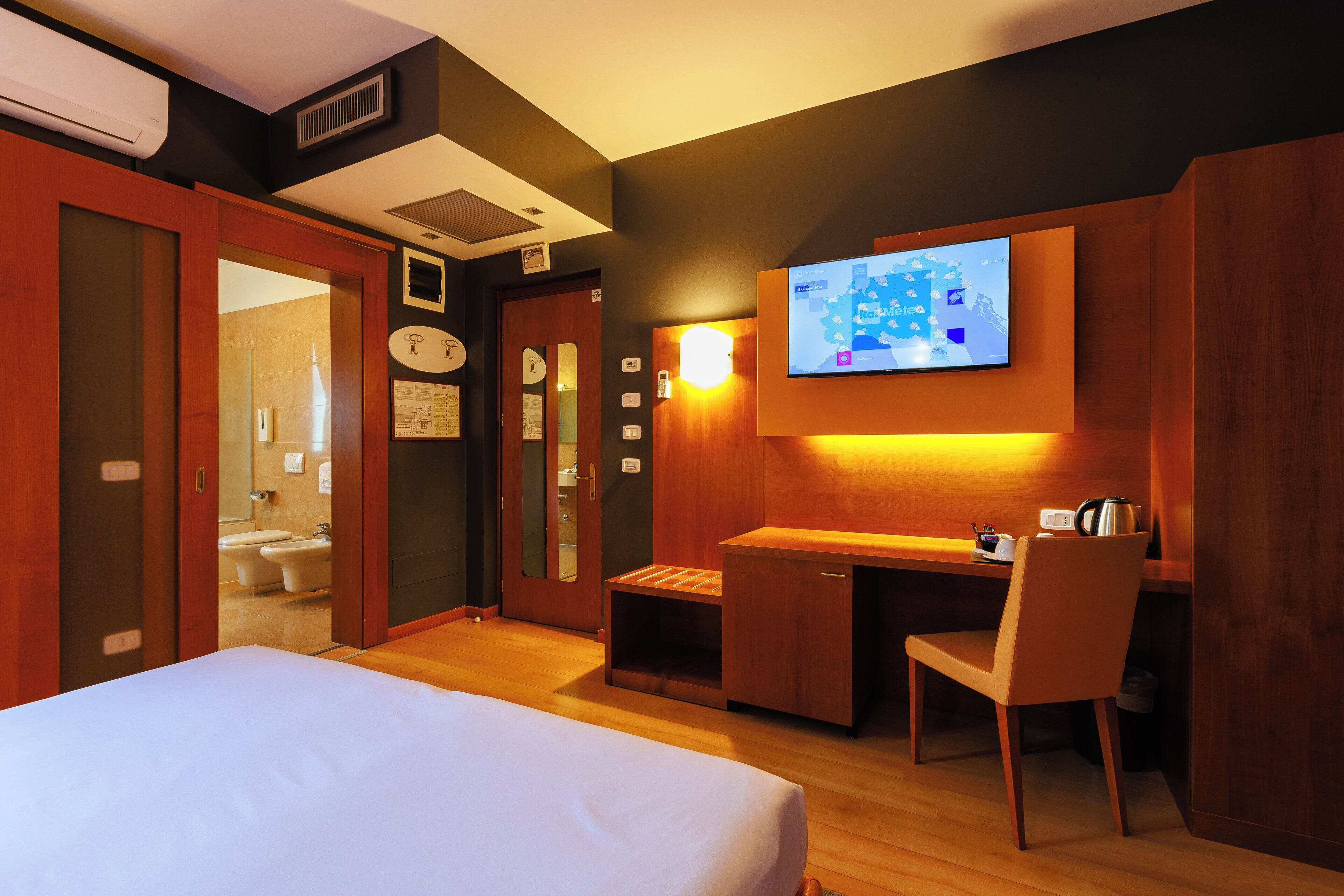 Literie hypoallergénique, minibar, coffres-forts dans les chambres