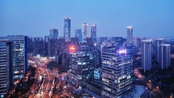 A high-rise urban area with modern buildings and busy streets.