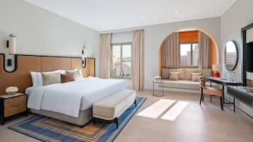 Premium bedding, down duvets, minibar, in-room safe