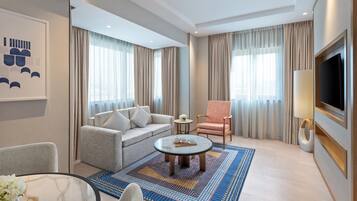 Junior Suite, Newly Renovated, Evening Drinks & Canapes Section, Free Shuttle To Public Beach | Living area | 40-inch LCD TV with satellite channels, TV, pay movies