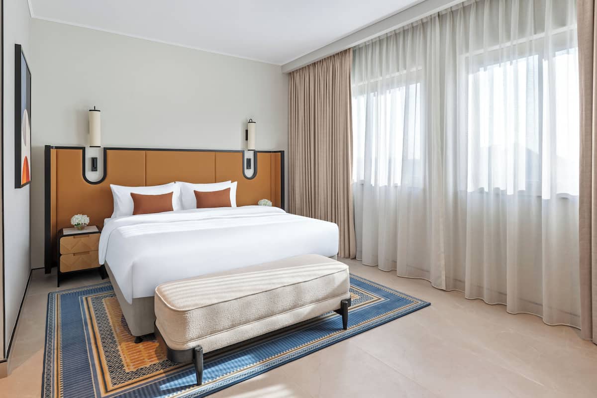 Premium bedding, down duvets, minibar, in-room safe