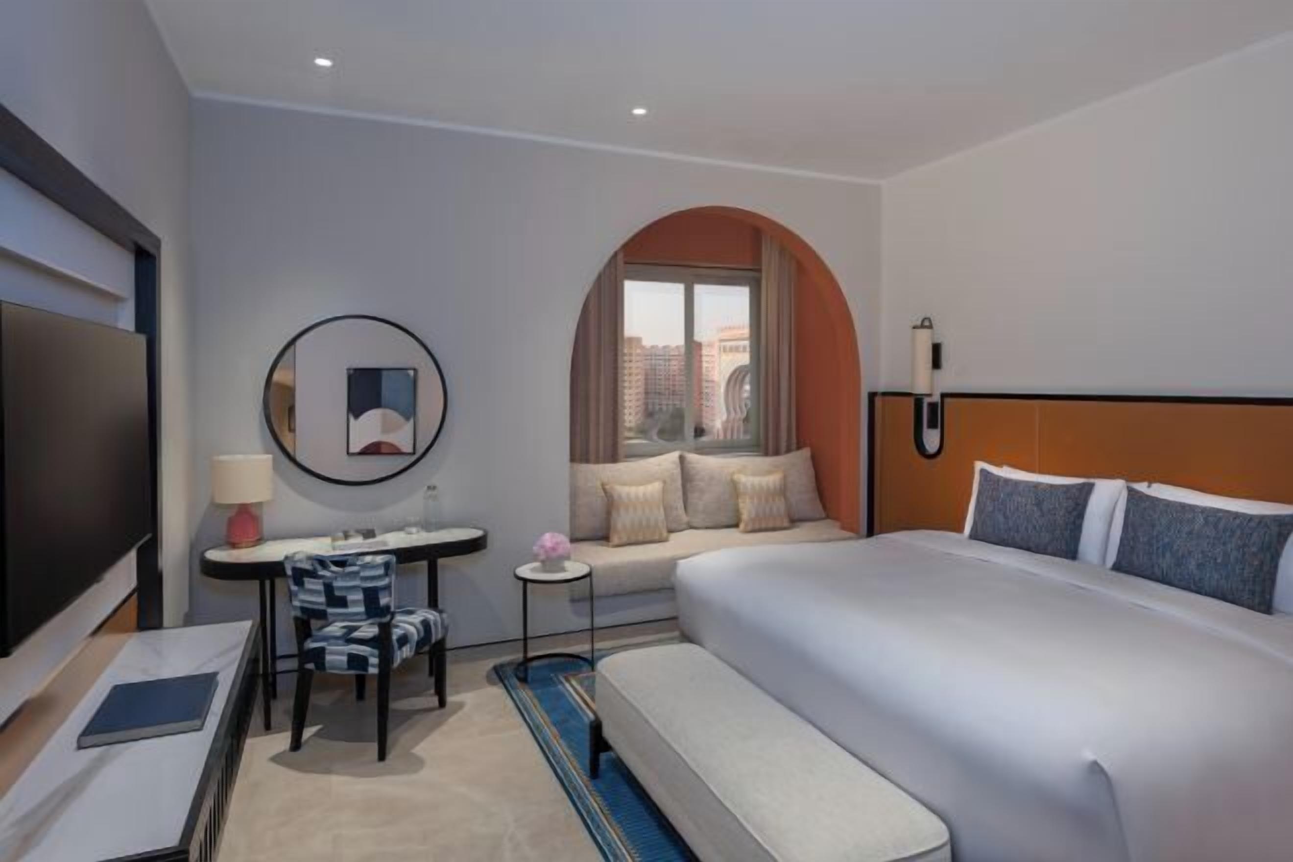 Premium bedding, down duvets, minibar, in-room safe