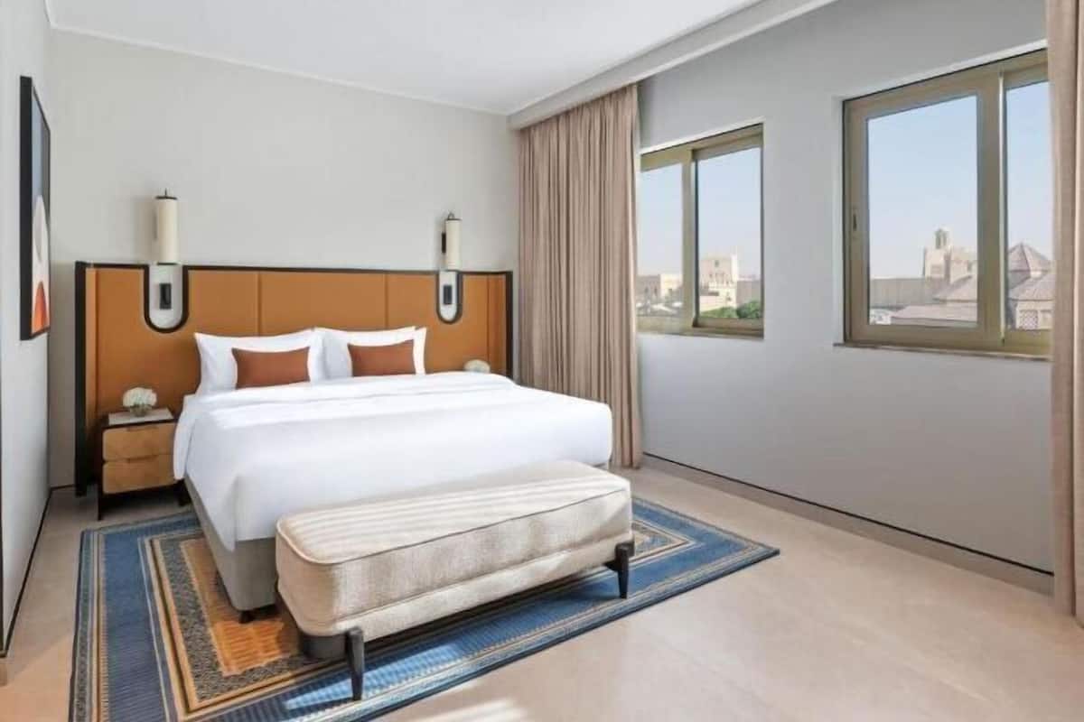 Premium bedding, down comforters, minibar, in-room safe