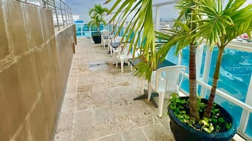 Outdoor pool, pool umbrellas, pool loungers