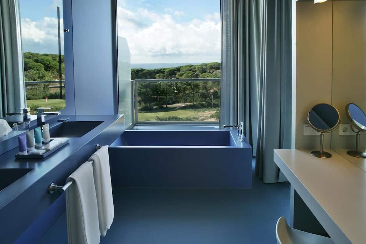 premium bedding, down duvets, minibar, in-room safe