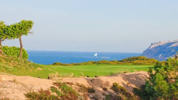 Enjoy a round of golf with a stunning ocean and mountain view.