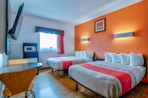 Memory foam beds, desk, laptop workspace, blackout drapes