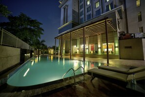 Outdoor pool, open 8:30 AM to 6:30 PM, pool umbrellas