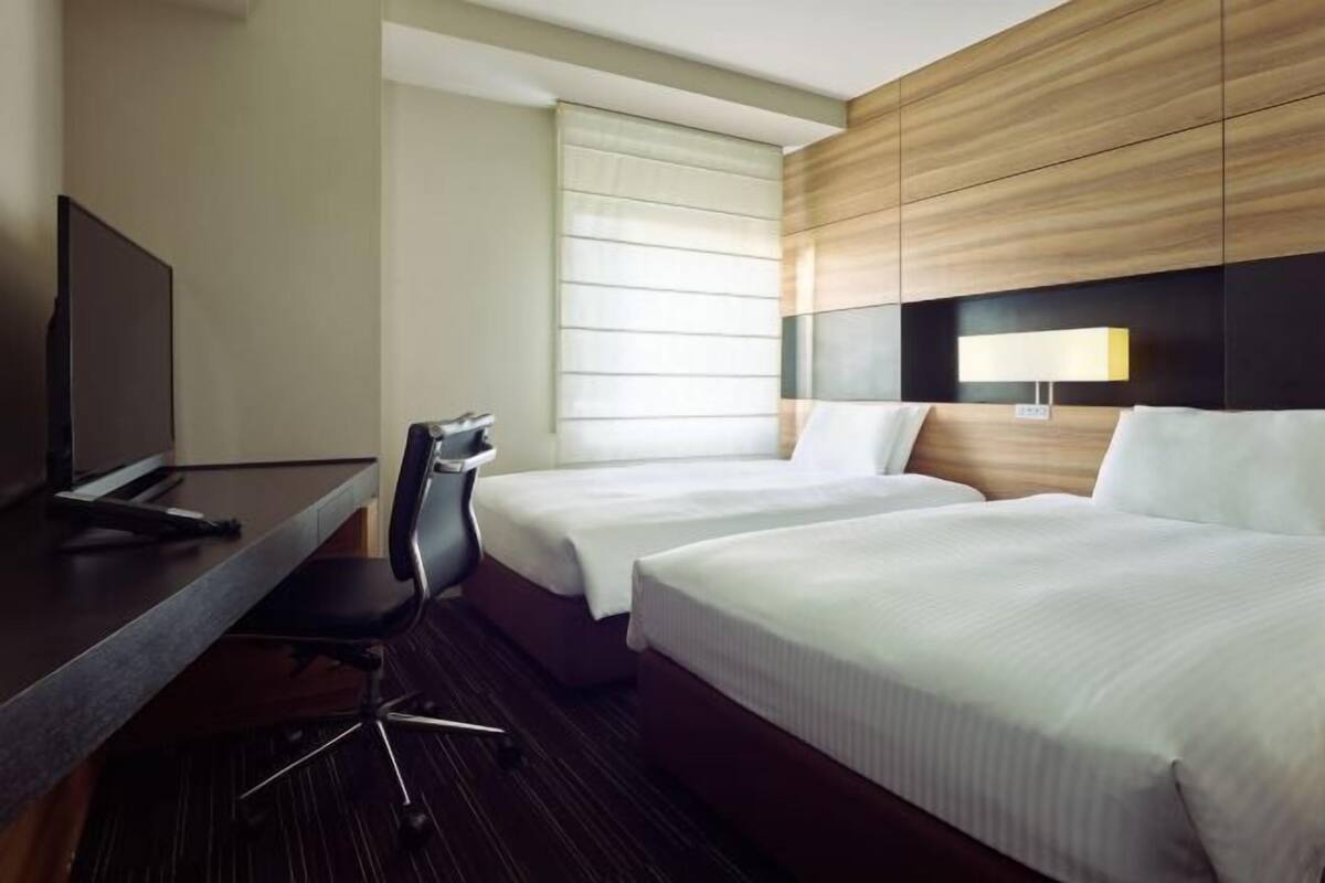 Premium bedding, down comforters, in-room safe, desk