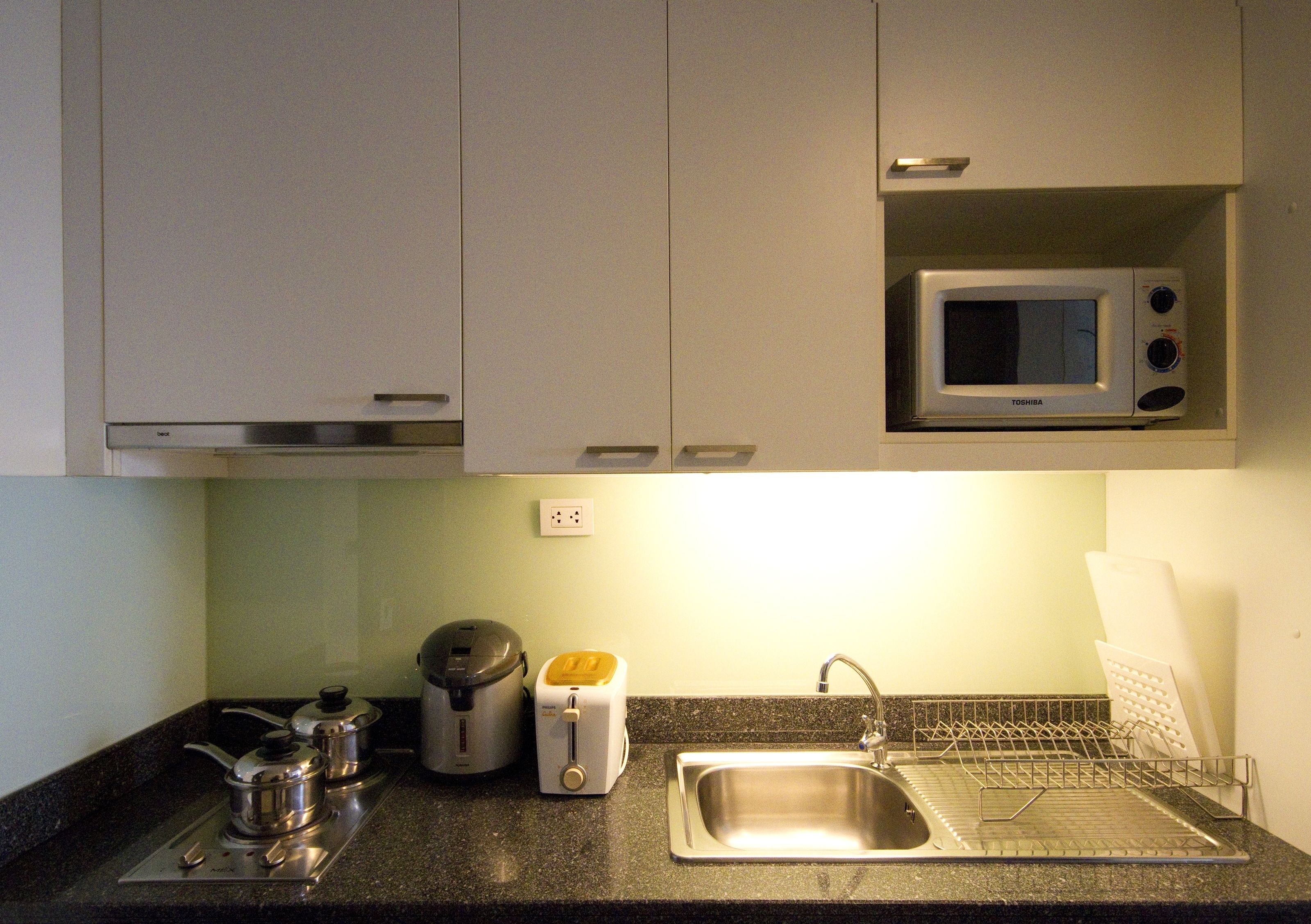 fridge, microwave, stovetop, electric kettle